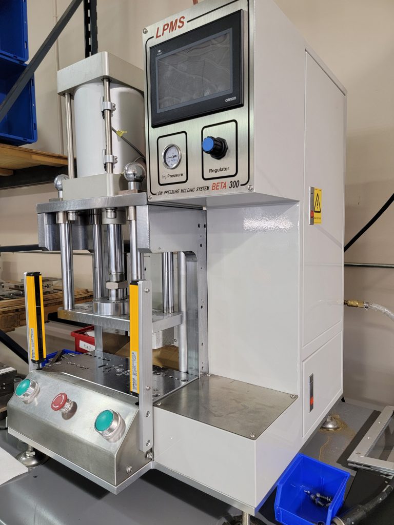 low pressure molding machine